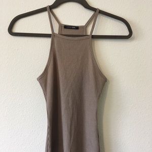Nude, high-neck tank top. Never worn!